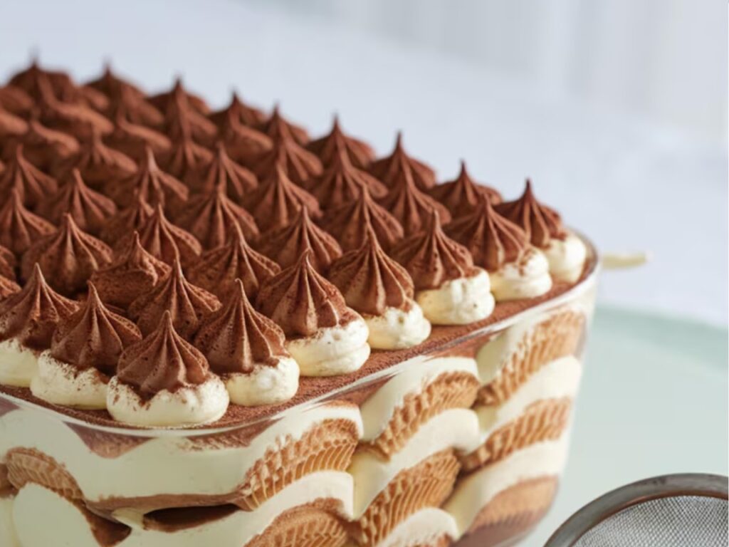 An authentic tiramisu with espresso-drenched ladyfingers and creamy mascarpone layers.