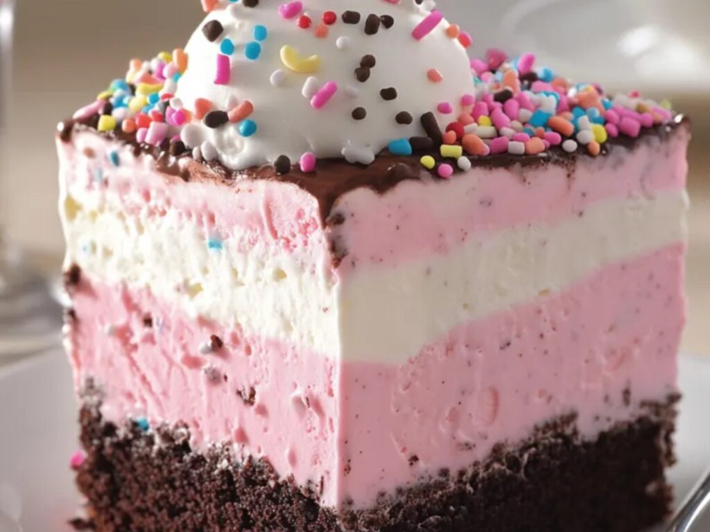 A refreshing ice cream cake layered with strawberry and vanilla flavors.